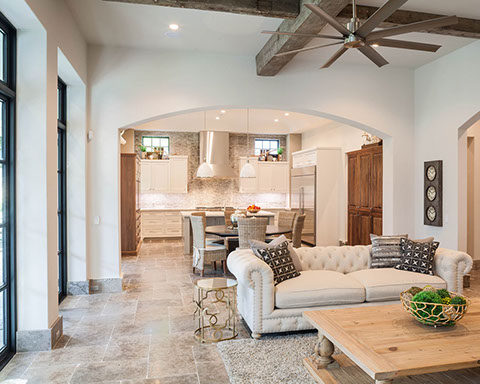 Gourmet kitchen with professional appliances open to family room