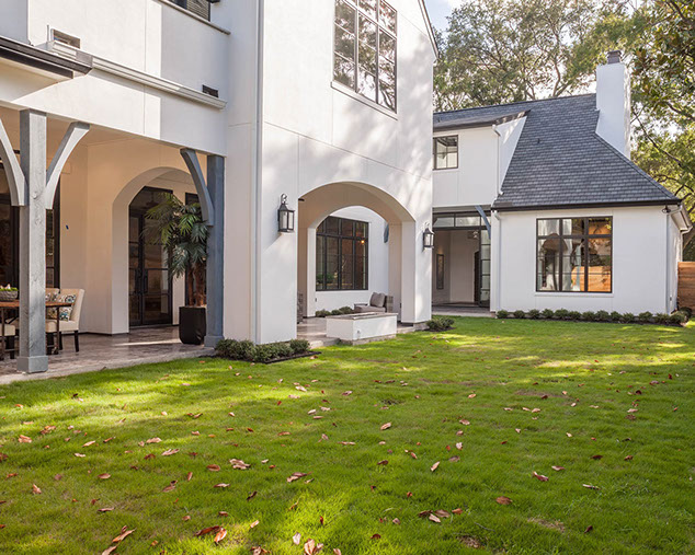 Spacious yard with outdoor living and modern fire feature