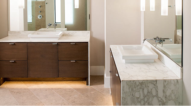 Floating modern master bath vanities with toe kick lighting