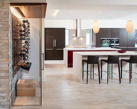 Poggenpohl modern red kitchen with glass wine room